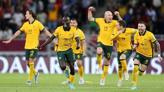 Awer Mabil celebrates the Socceroos’ shootout victory over Peru.