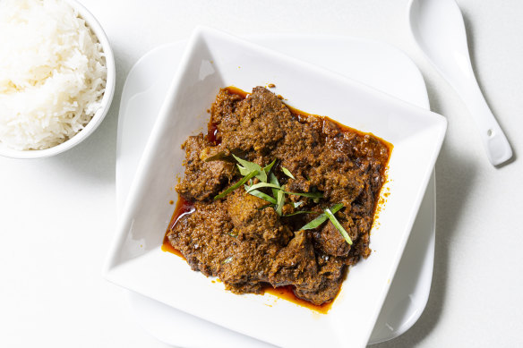 Beef rendang with roasted coconut.