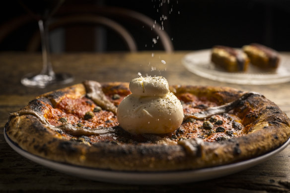 Burrata and anchovy pizza.