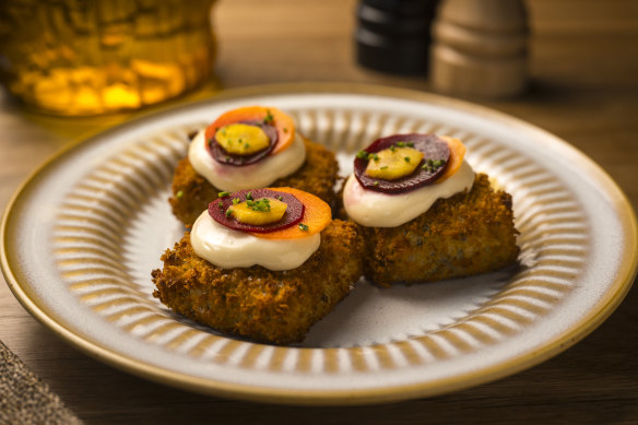 Chicken croquettes with roast garlic, pickled carrot and aioli.