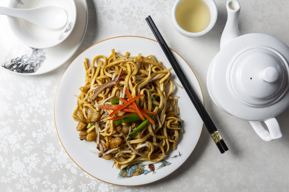 Wok-fried noodles with nubbins of lard.