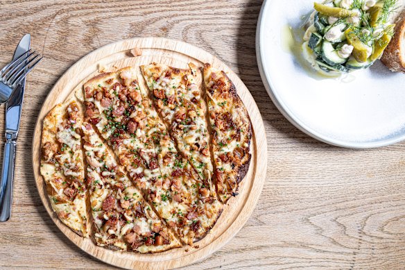 Bacon flammkuchen (left) and Bismarck salad (top right).