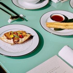 Baked Queensland blue swimmer crab in its shell with calamansi, and pork spring rolls.