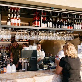 The venue is designed to capture the morning commuter crowd crossing the Kangaroo Point Bridge.