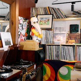 So What Stereo’s interior is stacked full of vinyl, CDs, retro lights and other knick knacks.