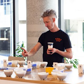 Roaster Alex Cole running a cupping session at Rumble.