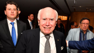 Former Australian Prime Minister John Howard arrives during the  count at the Federal Liberal Reception at the Sofitel-Wentworth hotel in Sydney on Saturday night.