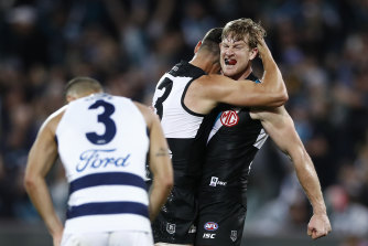 Tom Jonas and Ryan Burton celebrate on the siren.