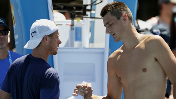 Hewitt and Tomic during the 2016 Australian Open. 