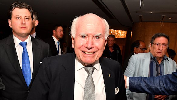 Former Australian Prime Minister John Howard arrives during the  count at the Federal Liberal Reception at the Sofitel-Wentworth hotel in Sydney on Saturday night.