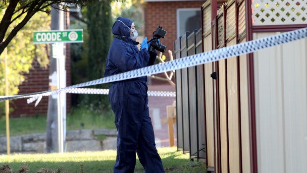 Forensic police officers are  inspecting the property in Bedford.