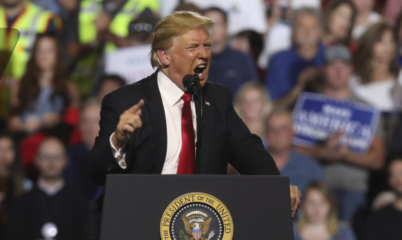 President Donald Trump addresses the audience at a Make America Great Again rally on Thursday.