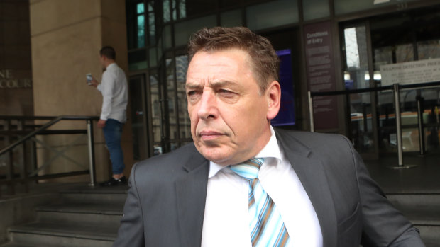 Mark "Bomber" Thompson leaves a hearing at Melbourne Magistrates Court last year.