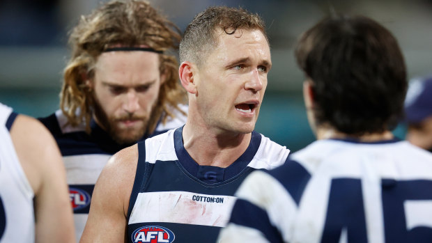 Cat’s skipper Joel Selwood addresses his players during the match.