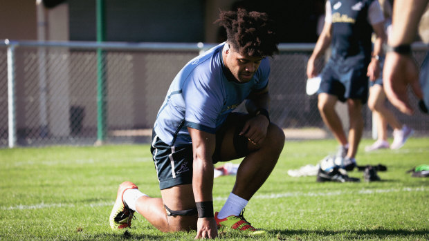 Rob Valetini on his knees at Wallabies training. 