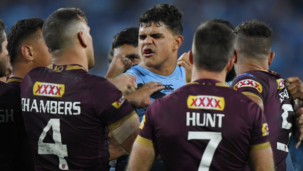 Running battle: Latrell Mitchell and Will Chambers were at each other throughout the 2018 Origin series.