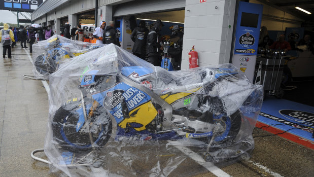 Going nowhere: MotoGP bikes protected from the weather in the cancelled British Grand Prix.