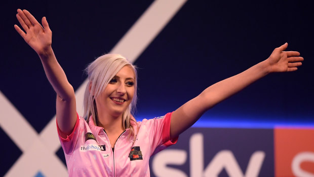 Fallon Sherrock takes in the applause after beating Mensur Suljovic at the World Darts Championship at Alexandra Palace.