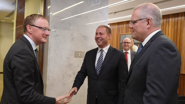 RBA governor Philip Lowe, with Treasurer Josh Frydenberg and Scott Morrison, wants the jobless rate down to least 4.5 per cent.