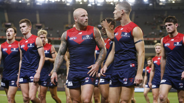 Dejected Melbourne players after another loss.