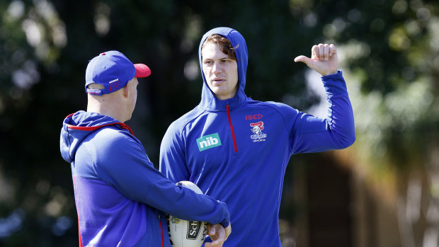 Positional switch: Kalyn Ponga talks with Newcastle coach Nathan Brown.