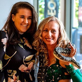 A guest at the Envie launch which featured live snakes.