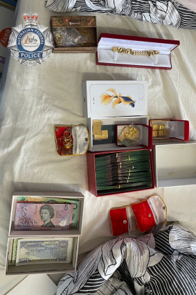 Gold bullions and cash seized at a Springvale home following a raid on an alleged money laundering syndicate by federal police.