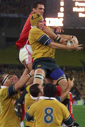 THAT lineout steal: Harrison grabs the key ball from the Lions' Martin Johnson in 2001 to clinch the series. 