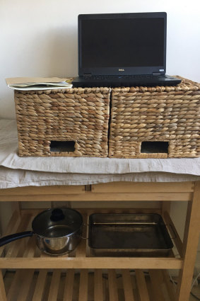 Gabby's kitchen set-up in the wake of standing desks being sold out across Australia. 