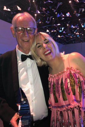 With daughter Jess, holding his Walkley award for best short feature, “Counting down the days in God’s waiting room”, which appeared in Good Weekend in 2018.