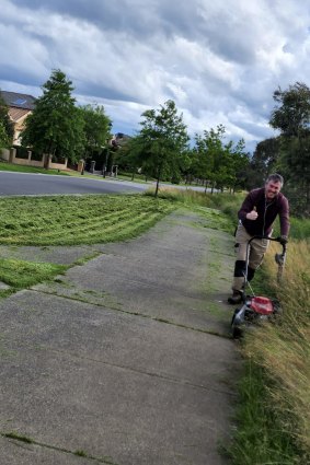 In Narre Warren, Doug McPhee worked for three hours with neighbours Puneet and Parth Arora last month to mow Loxley Boulevard with two push mowers.