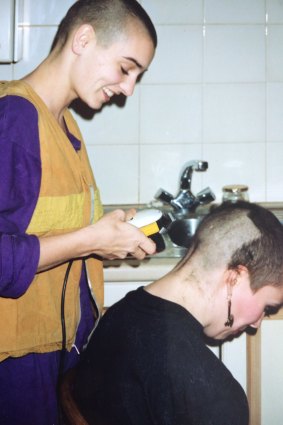 O’Connor shaves Woolcock’s hair off.