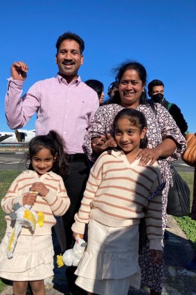 The Nadesalingam family at the airport.