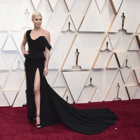 Charlize Theron arrives at the Oscars on Sunday, Feb. 9, 2020, at the Dolby Theatre in Los Angeles. (Photo by Jordan Strauss/Invision/AP)