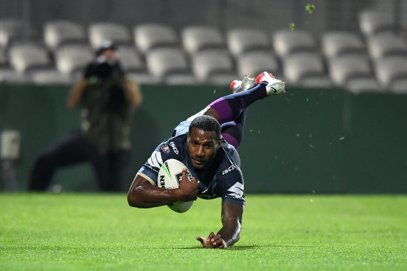 Hat-trick hero: Suliasi Vunivalu scores one of his three tries at Netstrata Jubilee Stadium.