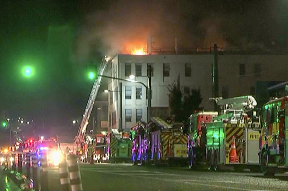 Fire trucks outside the burning hostel in Wellington.