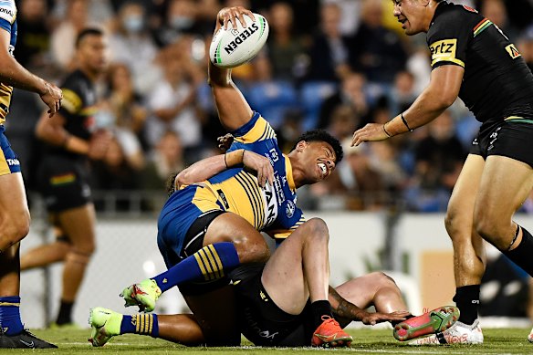 Waqa Blake of the Eels is tackled during the Panthers’ narrow win.