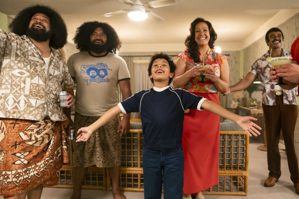 Ten-year-old Dwayne Johnson (Adrian Groulx) with the Wild Samoans (John Tui and Fasi Amosa, mother Ata (Stacey Leilua) and father Rocky (Joseph Lee Anderson) in Young Rock.