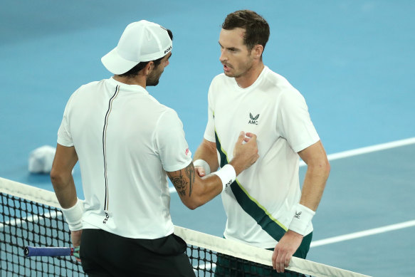 Andy Murray shakes hands with Matteo Berrettini after the game.