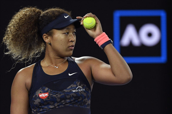 Naomi Osaka focuses on the way ahead as she prepares to serve against Jennifer Brady.