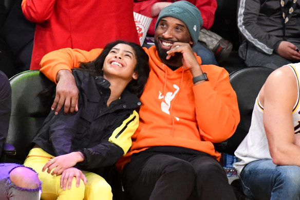 Kobe Bryant and daughter Gianna at a basketball game on December 29.