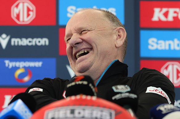 Hinkley has a laugh during his press conference ahead of his last game as Power coach.