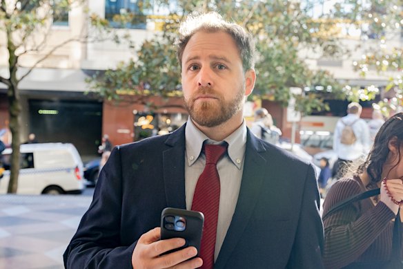 Justin Downs leaves Downing Centre District Court after his sentence submissions.