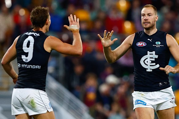 Carlton’s Patrick Cripps and Ben McKay enjoy a goal against the Lions.