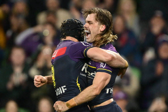 Ryan Papenhuyzen and Harry Granrt celebrate in Melbourne on Friday night.