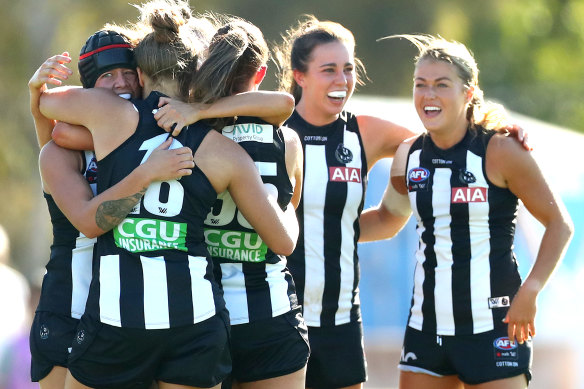 Magpies, including Brittany Bonnici, celebrate a finals win last season.