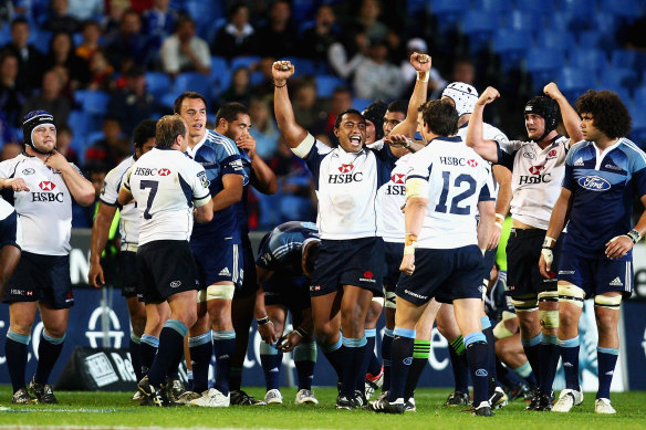The Waratahs celebrate after defeating the Blues at Eden Park in 2009 - the last time they came out on top at the venue.