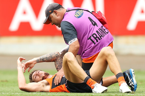 Brayden Maynard collected Daniel Lloyd, pictured, high as he tried to spoil a mark late in the second quarter.