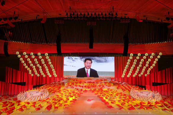 China’s President Xi Jinping appeared on a huge screen at the Gala. 