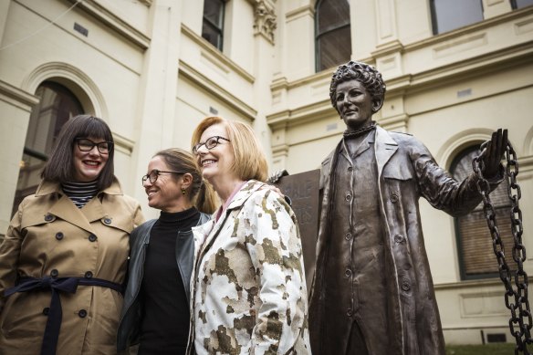 Former prime minister Julia Gillard (right) with Kristine Ziwica and Professor Clare Wright from A Monument of One’s Own and the statue of activist Zelda D’Aprano at Trades Hall.